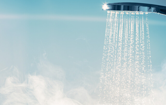Shower With Flowing Water And Steam